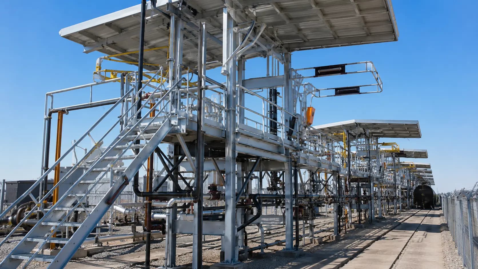 Structural steel pipe rack and equipment support framing outdoors