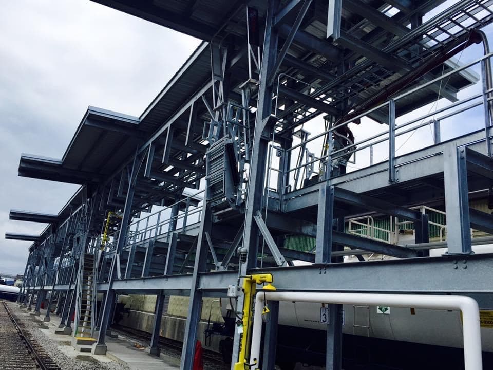 Structural steel platforms and loading systems for an industrial facility