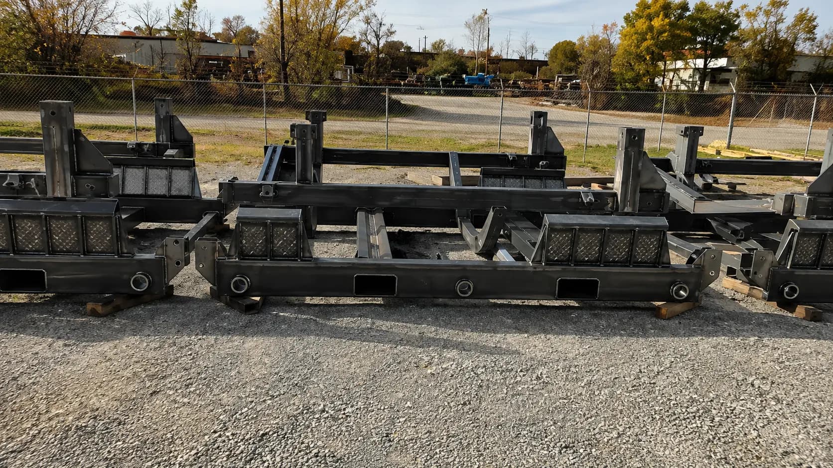 Fabricated transport and handling fixtures staged outdoors