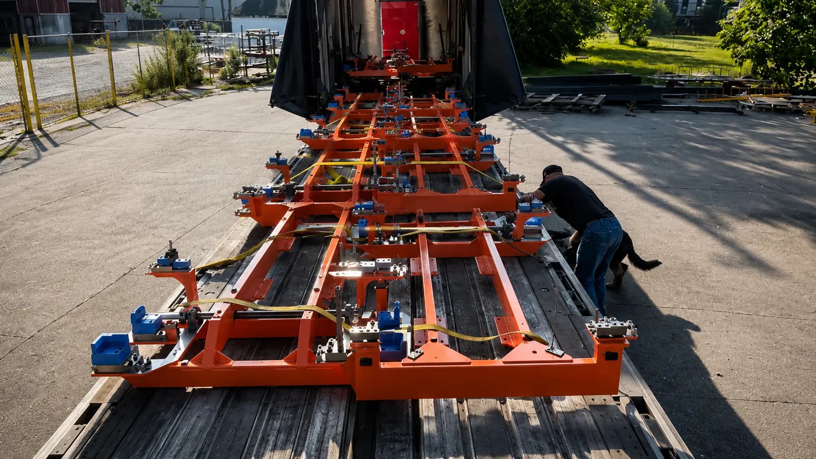 Fabricated steel production-line structure staged in the yard
