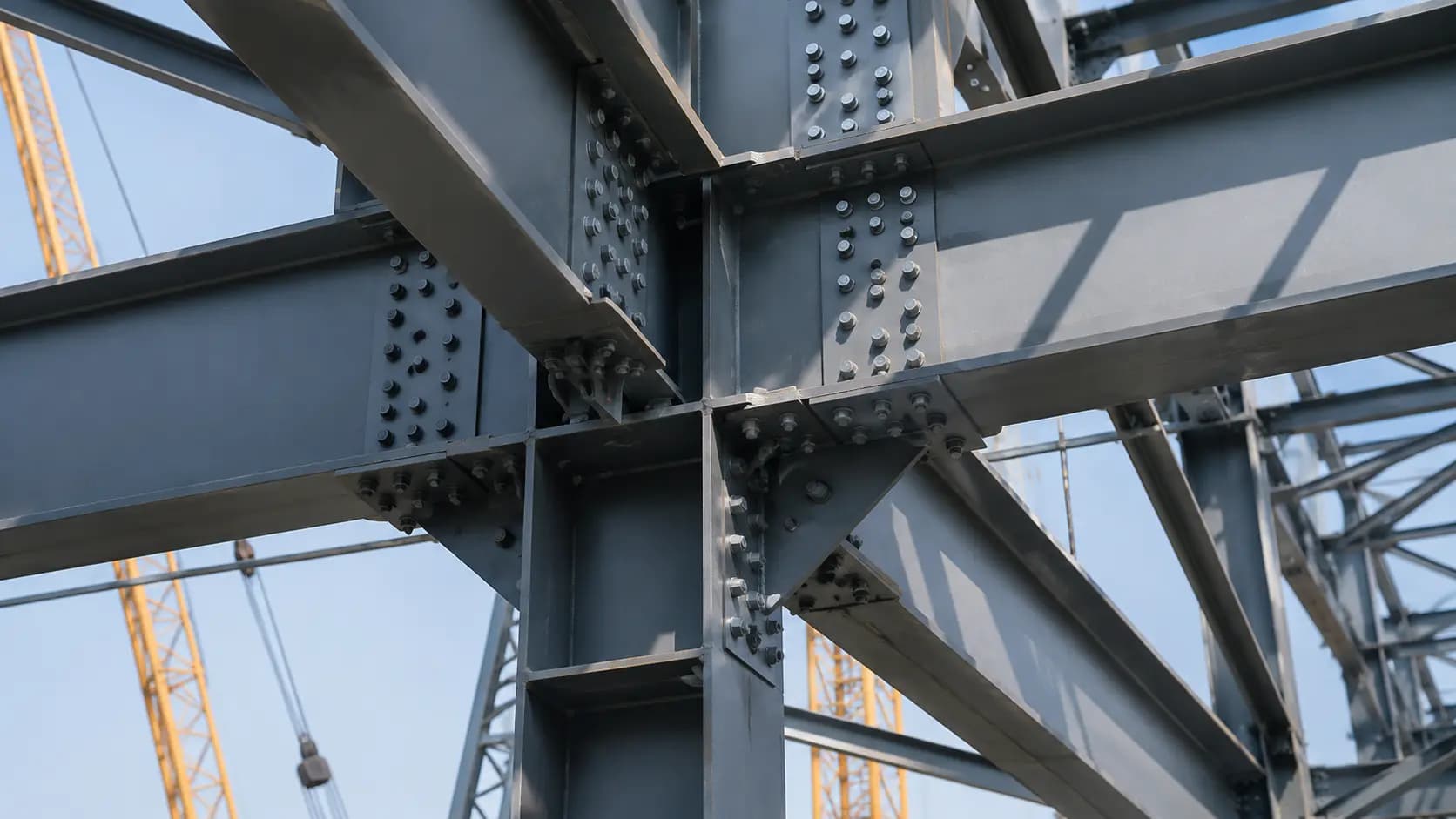 Structural steel connection detail with gusset plates and bolted joints