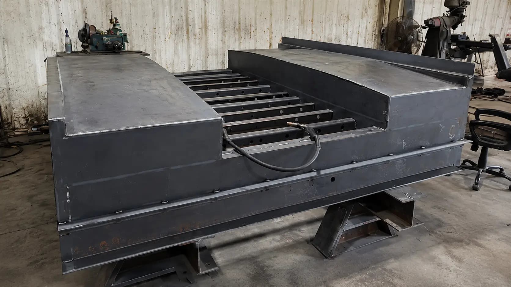 Large fabricated steel machine base in the Schuler shop