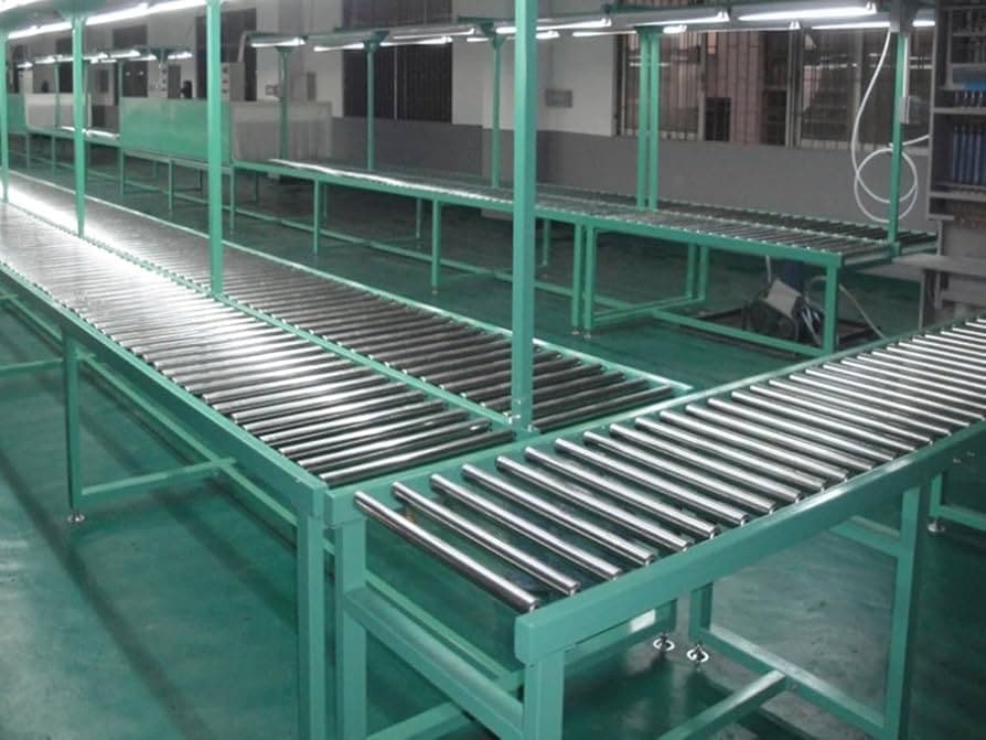 Green-painted gravity roller conveyor sections