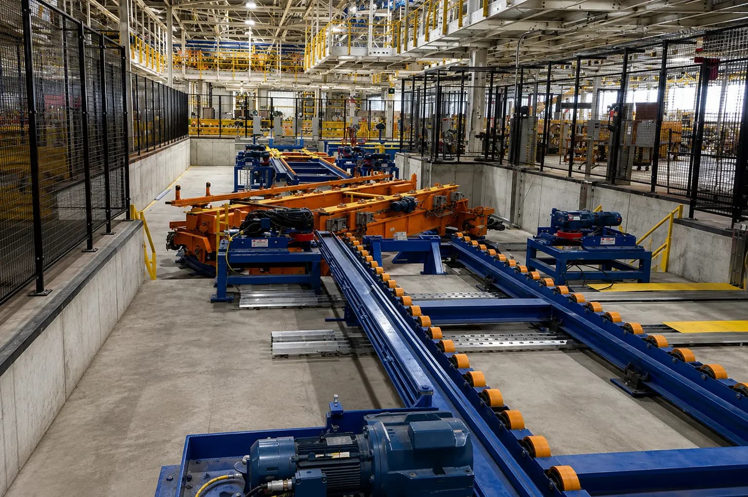 Automotive skillet conveyor line carrying vehicle bodies through general assembly